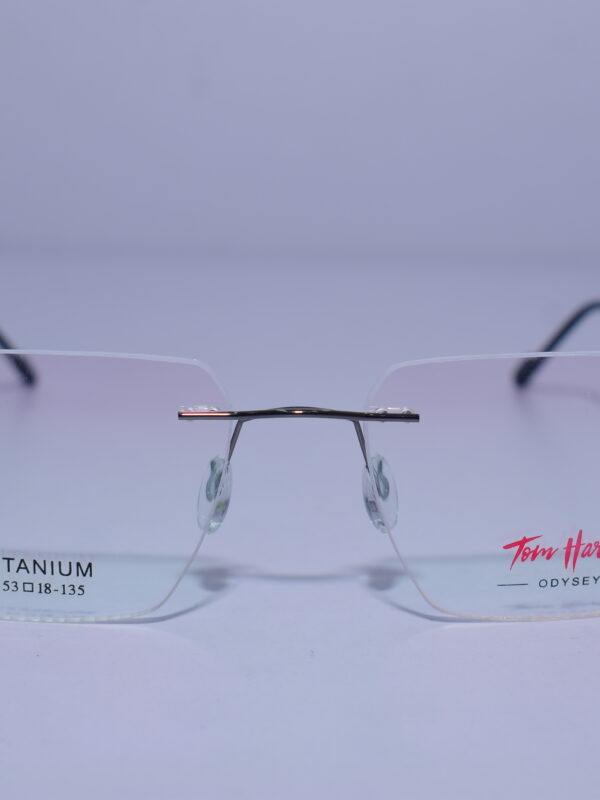 Tom Hardy Frameless Odysey Eye Wear metal frame